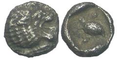 Greek Caria, Uncertain mint. Ca. 420-390 B.C. AR tetartemorion (5.9 mm, 0.25 g, 2 h). Forepart of lion left, head right / Bird standing left between two pellets, all within incuse square. SNG Keckman 