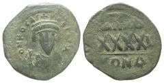 Byzantine BYZANTINE EMPIRE. Phokas, 602-610 AD. AE Follis (10.65 gm) of Constantinople. Crowned bust facing / Large XXXX. S.640. aVF, dark olive green patina. Scarce.