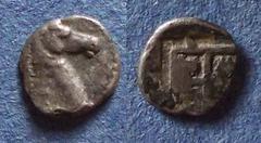 Greek Thraco-Macedonian, Uncertain Circa 400 BC, Tetartemorion, .15g: Obv: Head and neck of a horse right Rev: Quadripart incuse punch, square with a pellet within in each quarter. Tzamalis 91v.