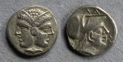 Greek Mysia, Lampsakos Circa 300 BC, Diobol, 1.19g: Obv: Janiform head: male/female Rev: Head of Athena wearing a corinthian helmet right "LA" above. SNG France 1182. Nice example of the type.