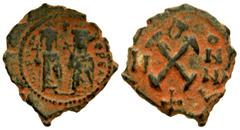 Byzantine Phocas and Leontia. 602-610. AE decanummium (17.48 mm, 3.08 g, 7 h). struck 603/4. δN FOCA-[N]Є PЄ AV, Phocas on left and Leontia on right standing facing; Phocas holds globus cruciger; Leon