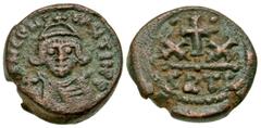 Byzantine Heraclius . 610-641. AE half follis (18.8 mm, 6.79 g, 9 h). Carthage mint. D N HЄRAC LI ЄT II PP (or similar), beardless helmeted and cuirassed bust of Heraclius facing, holding globus cruci