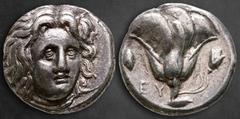 Greek Islands off Caria. Rhodos circa 305-275 BC. Didrachm AR 19 mm, 6,66 g Head of Helios facing slightly right / Rose with bud to right; POΔIΩN above, jug or grapecluster(?) and EY to left. Nearly E