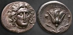 Greek Islands off Caria. Rhodos circa 304-275 BC. Didrachm AR 21 mm, 6,67 g Head of Helios facing slightly right / Rose, bud to left and right; A and trident flanking rose; POΔION above. Good Very Fin