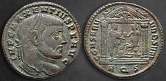 Roman Imperial Maxentius AD 306-312. Struck AD 307. Aquileia Follis Æ 26 mm, 6,59 g IMP C MAXENTIVS P F AVG, laureate head right / CONSERV VRB SVAE, Roma seated left on shield in tetrastyle temple, ha