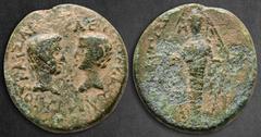 Roman Provincial Ionia. Magnesia ad Maeander. Augustus 27 BC-AD 14. Bronze Æ 19 mm, 5,54 g ΛΕΥ[ΚΙΟΣ ΚΑΙΣΑΡ] ΓΑΙΟΣ ΚΑΙΣΑΡ, bare heads of Lucius and Gaius Caesar facing each other, monogram between / [Μ