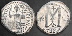 Byzantine Justinian I AD 527-565. Theoupolis (Antioch) Follis or 40 Nummi Æ 33 mm, 17,81 g D N IVSTINIANVS P P AVG, Justinian enthroned facing, holding long sceptre and globe cruciger / Large M betwee