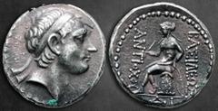 Greek Seleukid Kingdom. Uncertain 'ΔΙ' mint (Damaskos?). Antiochos III Megas 222-187 BC. Tetradrachm AR 27 mm, 17,04 g Diademed head right / ΒΑΣΙΛΕΩΣ ΑΝΤΙΟΧΟΥ, Apollo seated left on omphalos, testing 