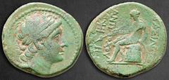 Greek Seleukid Kingdom. Antioch on the Orontes. Antiochos III Megas 222-187 BC. Bronze Æ 26 mm, 13,19 g Laureate head of Antiochos III, as Apollo, right / ΒΑΣΙΛΕΩΣ ΑΝΤΙΟΧΟΥ, Apollo seated left on omph