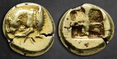 Greek Mysia. Kyzikos circa 550-500 BC. Sixth Stater or Hekte EL 11 mm, 2,65 g Forepart of lion left, devouring prey; to right, tunny upward / Quadripartite incuse square. Very Fine Cf. von Fritze I, 4
