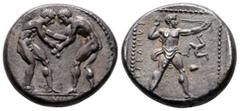 Greek Pamphylia. Aspendos circa 380-325 BC. Stater AR 23 mm, 10,92 g Two wrestlers grappling; pellet between / EΣTFEΔIIYΣ, slinger in throwing stance right; triskeles to right; all within beaded squar