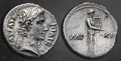 Roman Imperial Augustus 27 BC-AD 14. Lugdunum Denarius AR 19 mm, 3,68 g AVGVSTVS DIVI•F, laureate head right / IMP XII/ [ACT], Apollo Citharoedus of Actium standing right, holding lyre with his left h