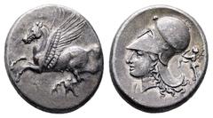Greek Corinthia. Corinth circa 375-300 BC. Stater AR 22 mm, 8,45 g Pegasos flying left; koppa below / Head of Athena to left, wearing Corinthian helmet; before neck, Ieft; behind neck guard, Nike flyi
