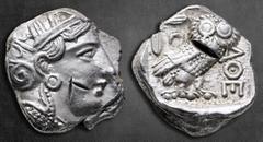 Greek Attica. Athens circa 393-294 BC. Tetradrachm AR 22 mm, 17,20 g Head of Athena with profile eye to right, wearing crested Attic helmet adorned with three olive leaves and and pi-style palmette, r