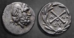 Greek Achaia. Antigoneia (Mantinea). Achaian League circa 188-180 BC. Triobol-Hemidrachm AR 15 mm, 2,39 g Laureate head of Zeus right / Achaian League monogram, A-N across field, EY monogram below , a