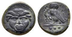 Sicily, Kamarina. Circa 420-405 BC. Æ Tetras. Facing gorgoneion / Owl standing right, head facing, grasping lizard; ••• (mark of value) in exergue. Westermark & Jenkins Period 3, 185; CNS 10; HGC 2, 5