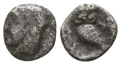 Greek Asia Minor. Uncertain mint circa 500-400 BC. Tetartemorion AR 6mm., 0,13g. Head of Apollo left / Owl standing left, head facing, unknown symbol to right, within incuse square. nearly very fine C