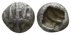 Greek Asia Minor. Uncertain mint circa 500-400 BC. Hemiobol AR 5mm., 0,31g. Radiate head of lion facing / Incuse punch. very fine Rosen 395 var. (diobol); Klein 232 var. (diobol).