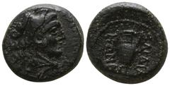 Greek Lydia. Sardeis BC 133 - AD 14. Autonomous issue.. Bronze Æ 13mm., 3,58g. Head of Herakles right, wearing lion skin / ΣΑΡΔΙΑ-ΝΩΝ; kantharos, monogram to left. very fine Johnston 228-30 (various m
