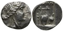 Greek Lycia. Olympos. Lycian League circa 167-100 BC. Hemidrachm AR 13mm., 2,17g. Laureate head of Apollo right / [OΛY]MΠ; lyre, to left, torch, to right, sword and shield. very fine Troxell, Lycian L