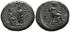 Roman Provincial Lydia. Sardeis . Tiberius and Livia AD 14-37. Bronze Æ 21mm., 4,50g. Togate figure of emperor raising kneeling figure of Tyche of Sardes / Livia seated right, holding sceptre and ears