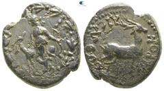 Roman Provincial Lydia. Hierokaisareia . Pseudo-autonomous issue AD 98-161. Bronze Æ 17mm., 4,83g. Artemis standing facing, head left, holding bow and resting hand upon stag standing left, head right;