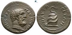 Roman Provincial Lydia. Nakrasa . Semi-autonomous issue circa AD 100-200. Bronze Æ 15mm., 2,51g. EΠI CTΡA MAΡ IOYNIANOY, bearded head of Herakles right / NAKΡACITΩN, serpent coiled around omphalos, he