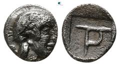 Greek Argolis. Possibly Troizen circa 450-400 BC. Tetartemorion AR 6mm., 0,24g. Helmeted head of Athena right / TP monogram within incuse square. very fine BMC Peloponnesus -; HGC -.