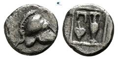 Greek Asia Minor. Uncertain mint circa 450 BC. Tetartemorion AR 4mm., 0,18g. Corinthian helmet right / Amphora and Π above ivy leaf in linear square. very fine CNG 288, lot 259 var.