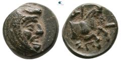 Greek Kings of Lydia. Sardeis. Spithridates 334 BC. Bronze Æ 8mm., 1,09g. Head of Satrap right, wearing mithra, the Persian headdress / ΣΠ-I, forepart of horse right, OT monogram at upper left. very f