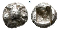 Greek Cilicia. Uncertain mint circa 400 BC. Tetartemorion AR 3mm., 0,16g. Crowned head of Persian king right (?) / Rough incuse square. nearly very fine Troxell & Kagan 16 var.