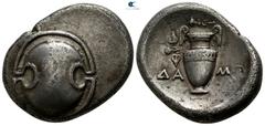 Greek Boeotia. Thebes. ΔΑΜΩ-, magistrate circa 392 BC. Stater AR 24mm., 11,86g. Boeotian shield / Amphora, two ivy leaves hanging down from left handle; In the field, ΔΑ-ΜΩ, above, club left. good ver