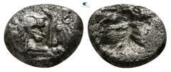 Greek Kings of Lydia. Sardeis. Kroisos 564-539 BC. 1/24 Stater AR 7mm., 0,79g. Confronted foreparts of lion and bull / Two square incuse punches. very fine Klein 562.