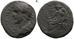Roman Provincial Lydia. Tralleis. Antoninus Pius AD 138-161. Bronze Æ 31mm., 22,74g. ANTΩNEINOC [...], laureate, and draped bust left / [...], Tyche seated, left, wearing kalathos, holding statue of A