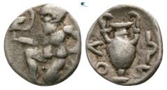 Greek Islands off Thrace. Thasos circa 450-400 BC. Hemiobol AR 8mm., 0,36g. Satyr kneeling left, holding kantharos with right hand / ΘΛ[Σ]-[Ι]ΩΝ, amphora. nearly very fine Le Rider, Thasienne 27 (obol