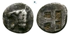 Greek Thraco-Macedonian Tribes. Uncertain mint circa 500 BC. Tetartemorion AR 3mm., 0,13g. Roaring lion's head left / Quadripartite incuse square. very fine Cf. CNG, Mail Bid Sale 58, 346 (head right)