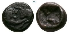 Greek Kings of Lydia. Sardeis. Kroisos 564-539 BC. 1/12 Stater AR 7mm., 0,77g. On the left, forepart of lion with open mouth to right confronting, on the right, forepart of bull to left / Incuse squar