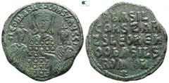 Byzantine Basil I, with Leo VI and Constantine VII AD 867-886. Constantinople Follis Æ 23mm., 5,97g. + LЄOҺ ЬASIL COҺST AЧGG', crowned facing busts of Basil between Leo and Constantine / + ЬASIL COҺST