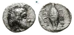 Greek Ionia. Magnesia ad Maeander circa 400-350 BC. Tetartemorion AR 5mm., 0,21g. Male head right / Barley grain between two maeander patterns. very fine SNG Kayhan 395-6; SNG Copenhagen -.