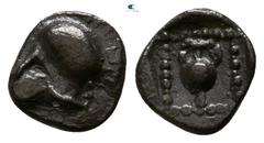 Greek Asia Minor. Uncertain mint circa 500-400 BC. Tetartemorion AR 5mm., 0,22g. Helmet left / Amphora within linear square. very fine Unpublished in the standard references, but see CNG E-369, lot 14