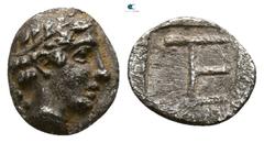 Greek Ionia. Kolophon circa 450-410 BC. Tetartemorion AR 7mm., 0,31g. Laureate head of Apollo right / TE monogram, all within incuse square. very fine Milne, Colophon 31.