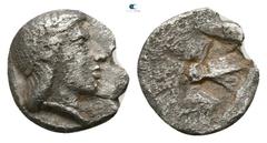 Greek Ionia. Kolophon circa 500-450 BC. Tetartemorion AR 6mm., 0,26g. Laureate head of Apollo right / Quadripartite incuse square. nearly very fine Cf. SNG von Aulock 7904.