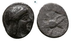 Greek Ionia. Kolophon circa 500-450 BC. Tetartemorion AR 5mm., 0,27g. Laureate head of Apollo right / Pellet within quadripartite incuse square. very fine Cf. SNG von Aulock 7904.