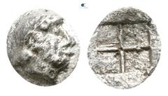 Greek Ionia. Kolophon circa 500-450 BC. Tetartemorion AR 3mm., 0,10g. Laureate head of Apollo right / Quadripartite incuse square. nearly very fine Cf. SNG von Aulock 7904 (hemiobol).