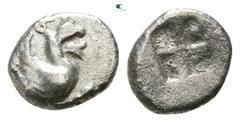 Greek Ionia. Teos 500-460 BC. Tetartemorion AR 5mm., 0,33g. Forepart of griffin right / Quadripartite incuse square. fine