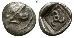 Greek Dynasts of Lycia. Uncertain mint. Uncertain Dynast circa 480-440 BC. Or Kuprilli 1/12 Stater AR 7mm., 0,48g. Forepart of winged bull or boar left / Triskeles in dotted square within incuse squar