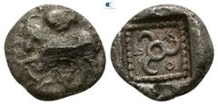 Greek Dynasts of Lycia. Uncertain mint. Kuprilli or Kubernis 470-440 BC. 1/6 Stater AR 8mm., 1,39g. Goat kneeling left, facing head of panther or shield (?) above / KOΠ, triskeles within dotted border