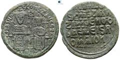 Byzantine Basil I the Macedonian, with Constantine. AD 867-886. Constantinople Follis Æ 26mm., 7,02g. + ЬASILO' S COҺST AЧGST', crowned figures of Basil and Constantine enthroned facing, each wearing 