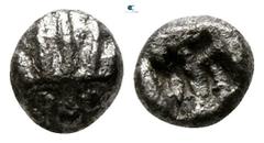 Greek Asia Minor. Uncertain mint circa 500-400 BC. Hemiobol AR 4mm., 0,27g. Facing head of lion, wearing radiate crown / Irregular incuse square punch. very fine Rosen 395 var. (diobol); Klein 232 var