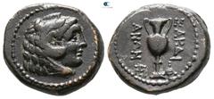 Greek Lydia. Sardeis circa 133 BC-AD 14. Bronze Æ 14mm., 4,04g. Unbearded head of Herakles right, wearing lionskin headdress / ΣAΡΔI-ANΩN, loutrophorus, monogram to lower left and right. very fine SNG